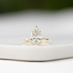 The Pave Alison Set  With A 2.5 Carat Pear 18K Yellow Gold Moissanite
