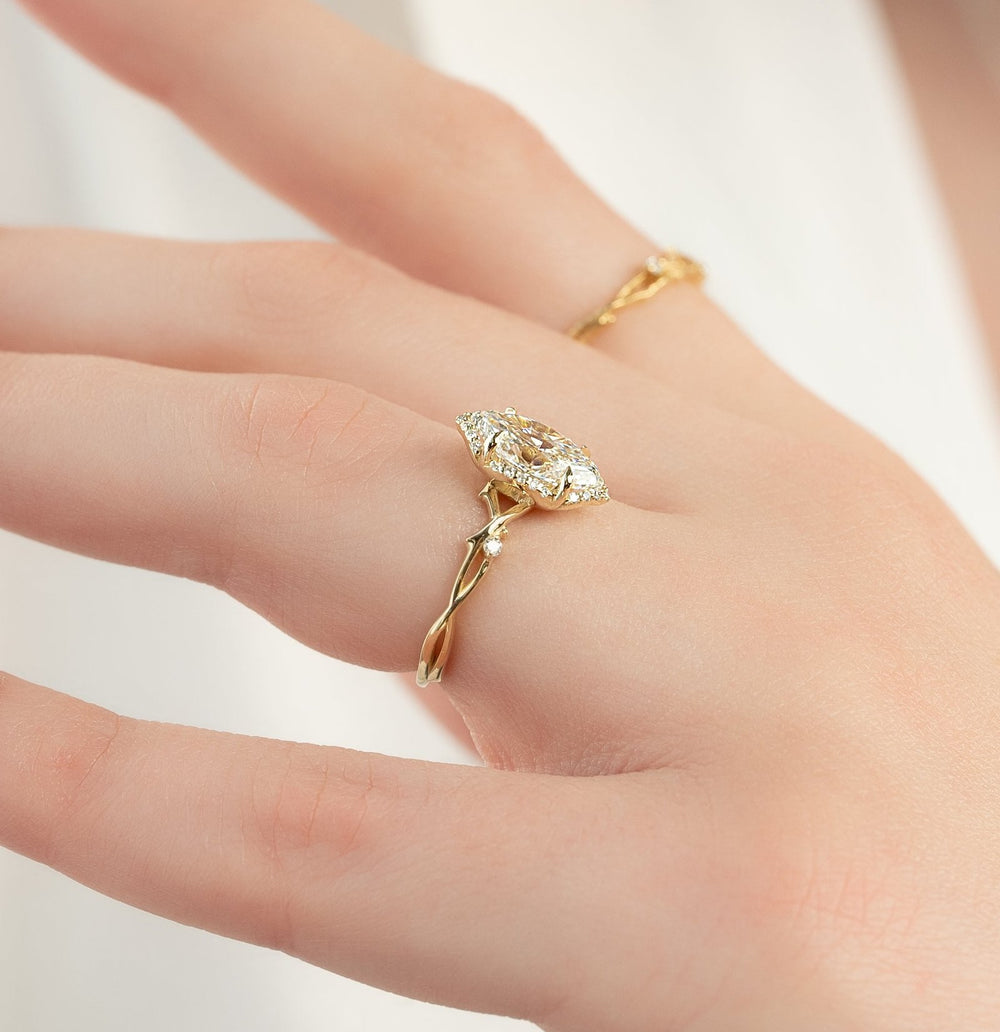 The Halo Twig Set  With A 4 Carat Marquise 14K Yellow Gold Moissanite