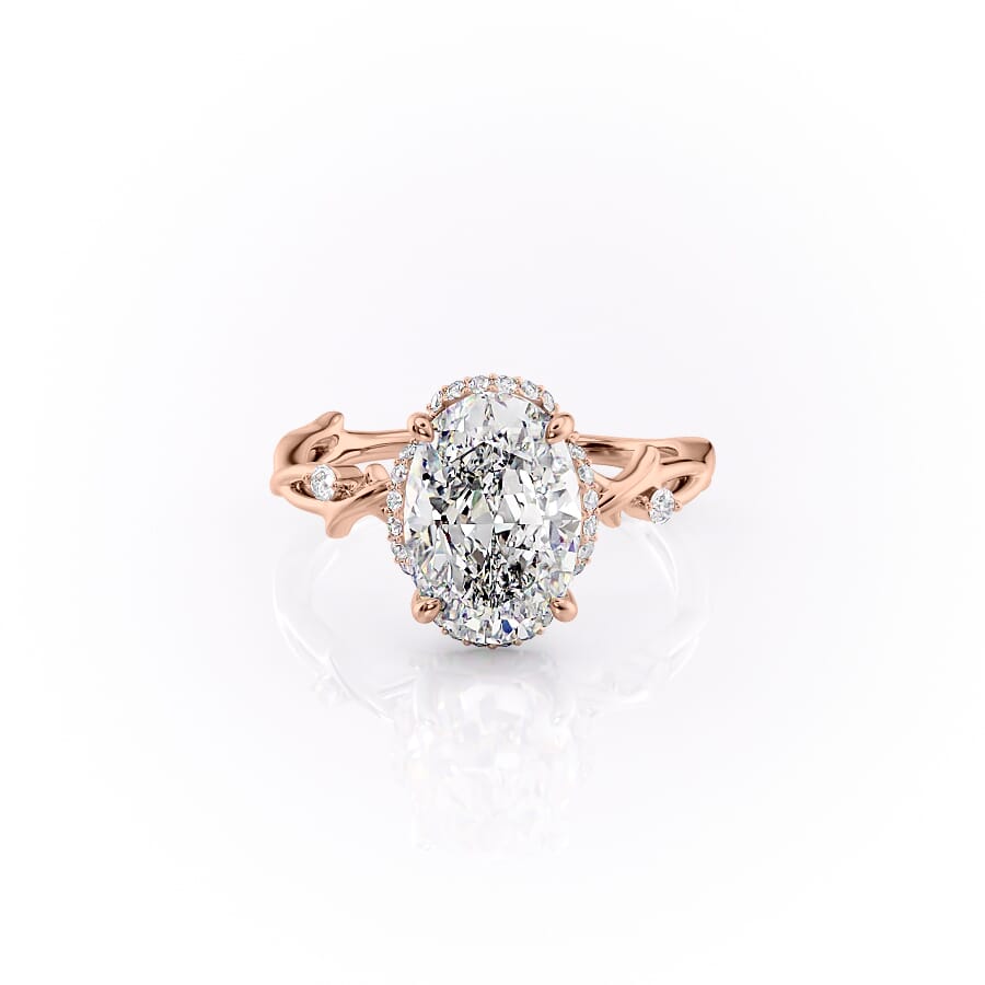 The Halo Twig Set With A 1.5 Carat Oval 14K Rose Gold Lab Diamond