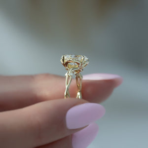 The Halo Twig Set  With A 3 Carat Oval 18K Yellow Gold Moissanite