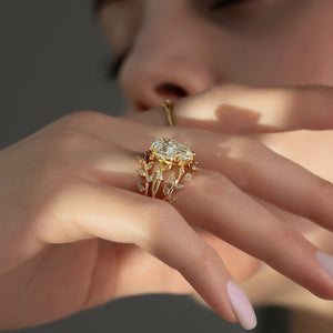The Halo Twig Set With A 2.5 Carat Pear 14K Yellow Gold Lab Diamond