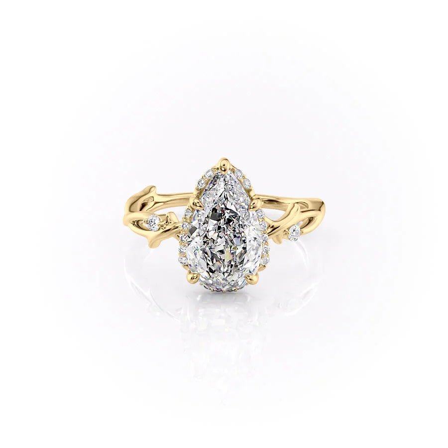 The Halo Twig Set  With A 3 Carat Pear 18K Yellow Gold Moissanite