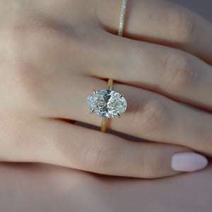The Sarah Set Pave  With A 2.5 Carat Oval 18K Yellow Gold Moissanite