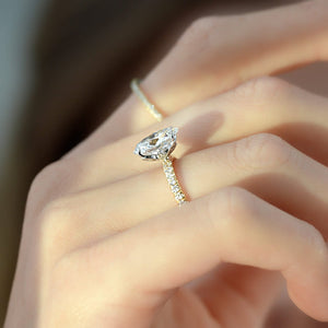 The Pave Lily Set  With A 4.5 Carat Oval 18K Yellow Gold Moissanite