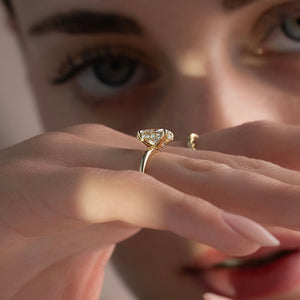 The Sandra Set  With A 2.5 Carat Oval 18K Yellow Gold Moissanite