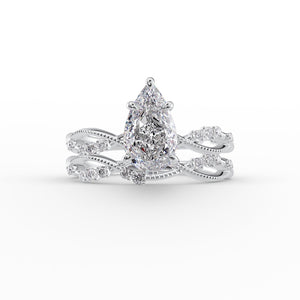 The Daisy Set  With A 2 Carat Pear 18K White Gold Moissanite