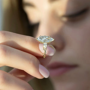 The Three Stone Twig Set  With A 5 Carat Marquise 18K Yellow Gold Moissanite