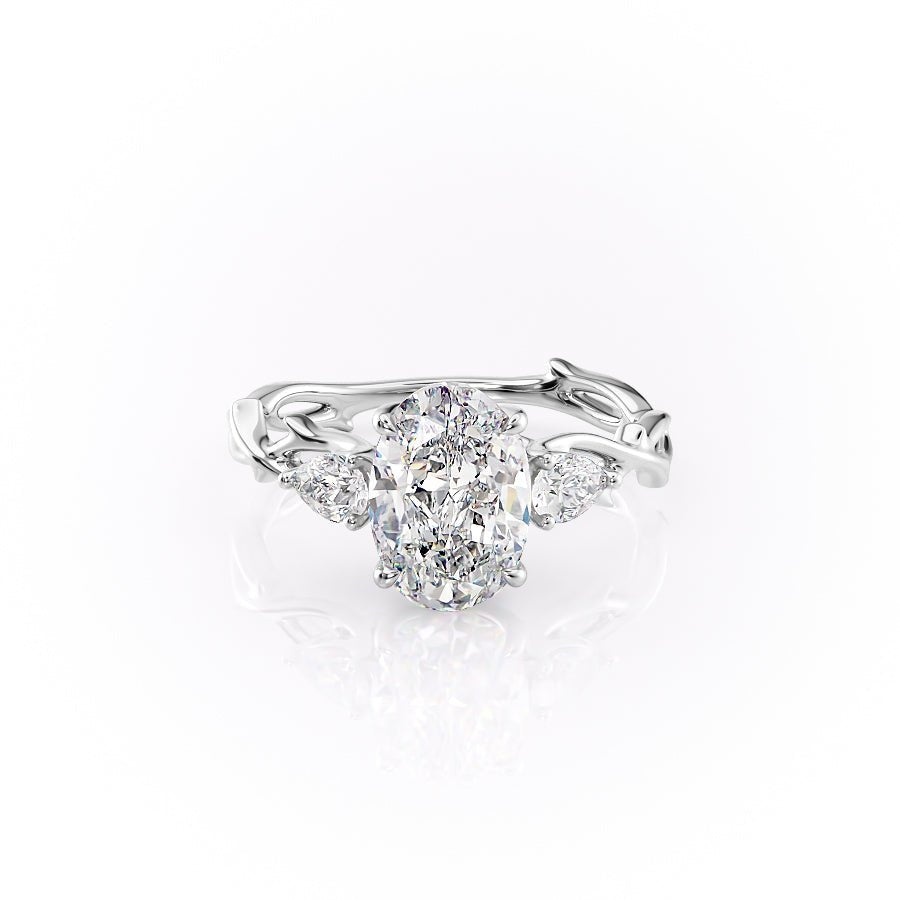 The Three Stone Twig Set  With A 2 Carat Oval 18K White Gold Moissanite