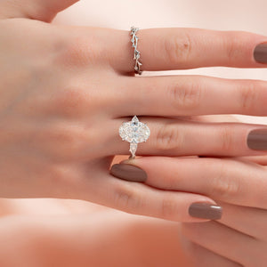 The Three Stone Twig Set  With A 2 Carat Oval 18K White Gold Moissanite