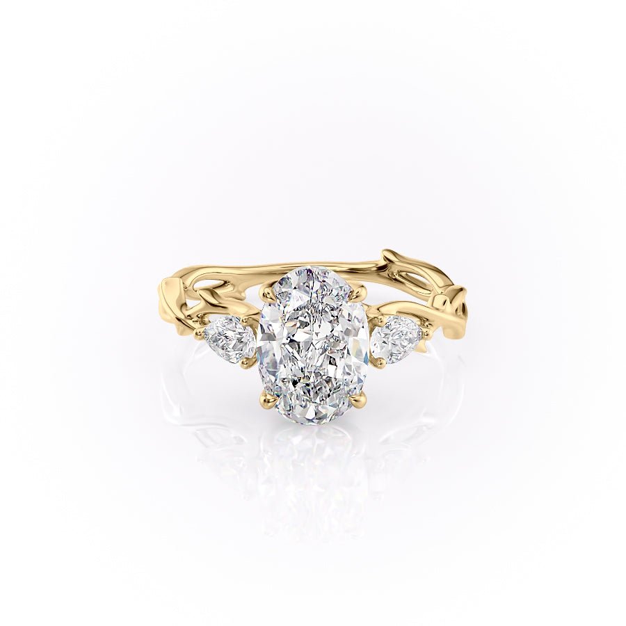 The Three Stone Twig Set  With A 3 Carat Oval 18K Yellow Gold Moissanite