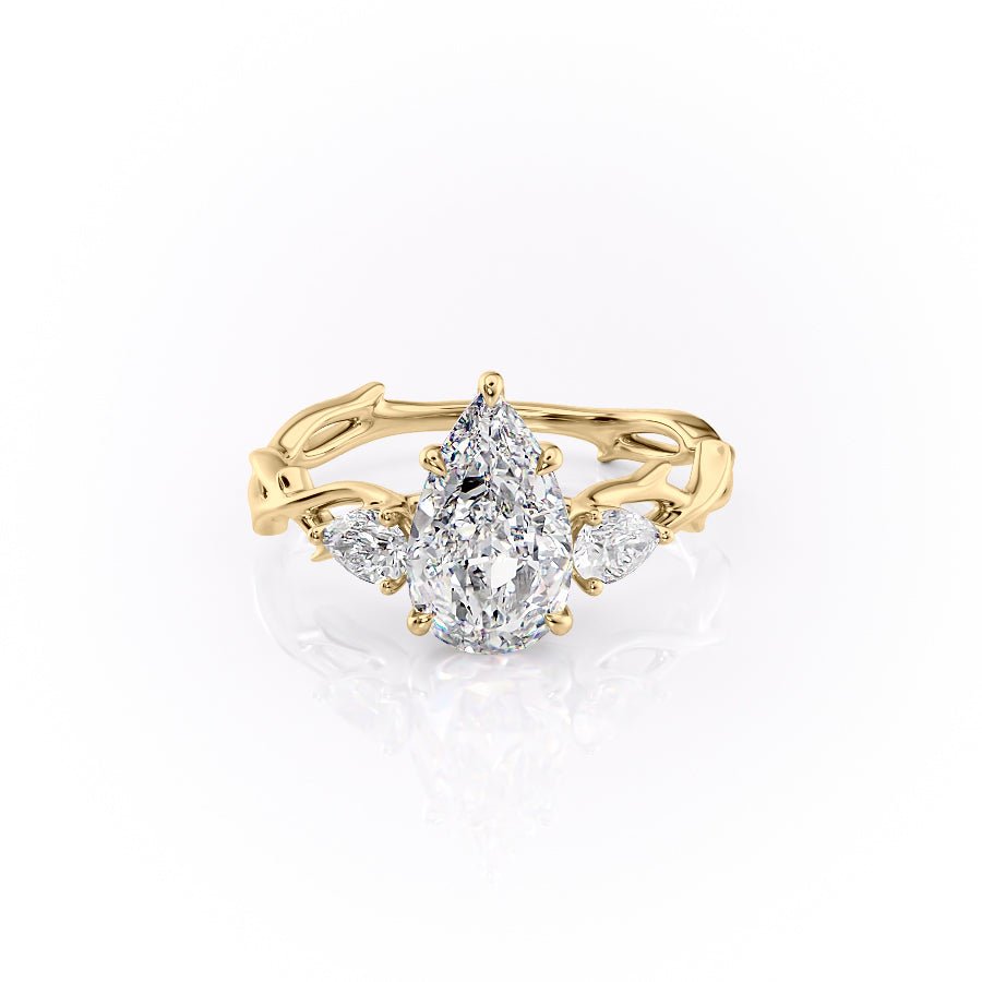 The Three Stone Twig Set  With A 3.5 Carat Pear 18K Yellow Gold Moissanite