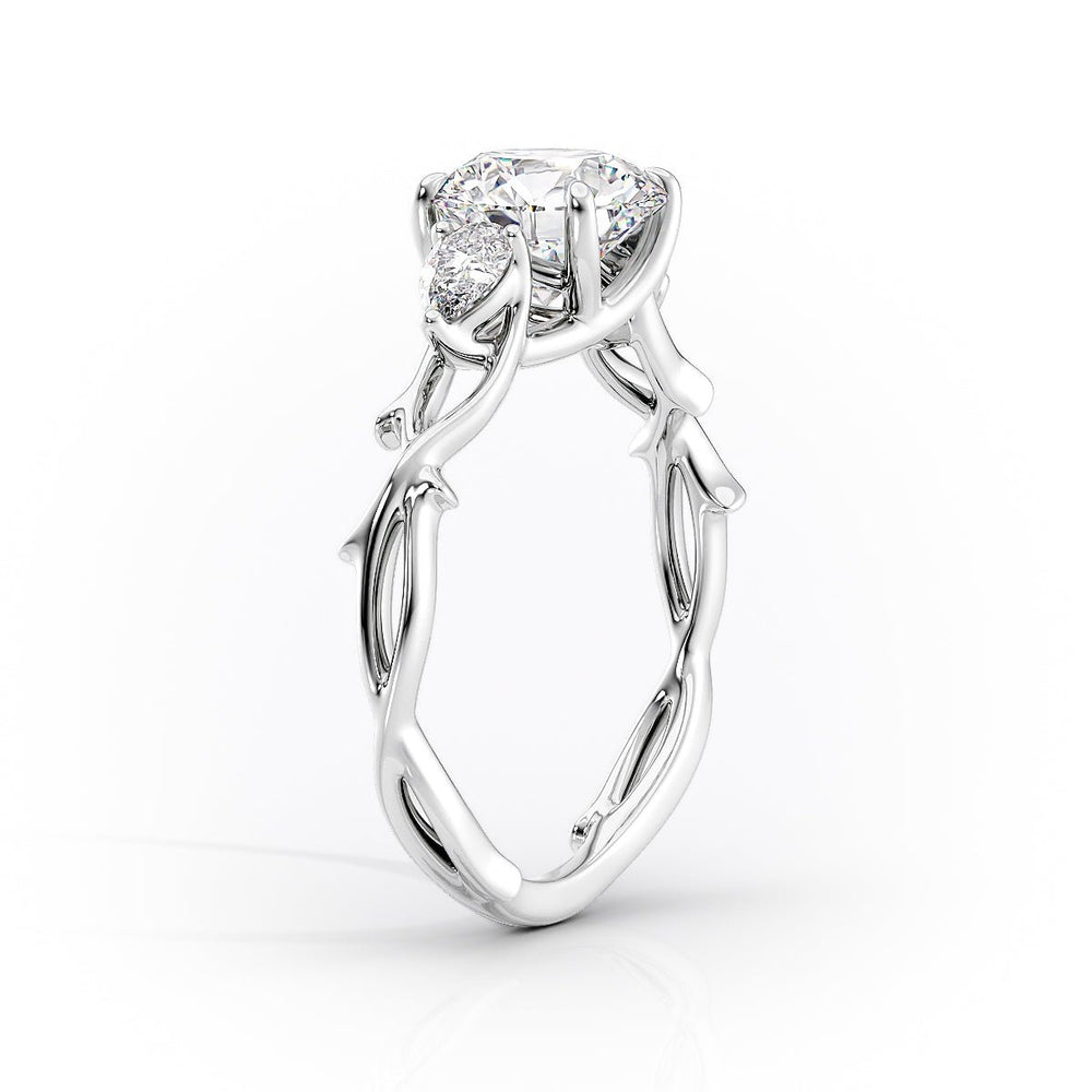 The Three Stone Twig Set  With A 4.5 Carat Oval 18K White Gold Moissanite