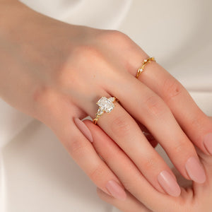 The Three Stone Twig Set With A 1.5 Carat Radiant 14K Yellow Gold Lab Diamond