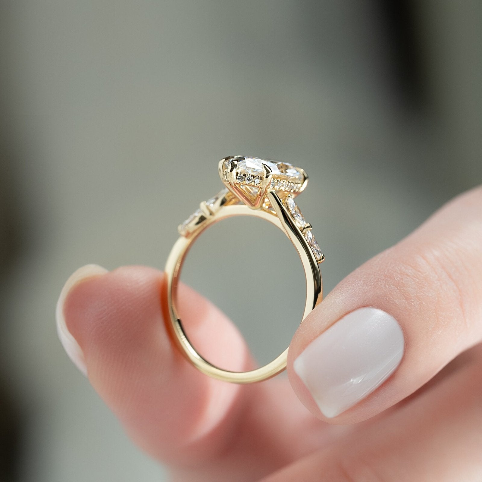 The Nova Set  With A 2.5 Carat Marquise 18K Yellow Gold Moissanite