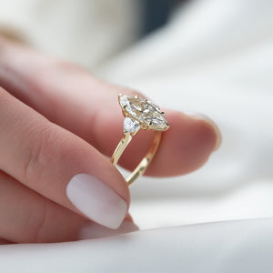 The Hearts Liv Set  With A 3 Carat Marquise 18K Yellow Gold Moissanite