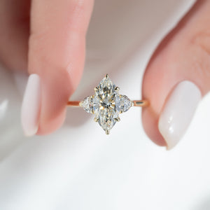 The Hearts Liv Set  With A 3 Carat Marquise 18K Yellow Gold Moissanite