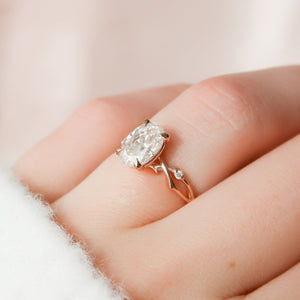 The Twig Set  With A 2.5 Carat Oval 14K Rose Gold Moissanite