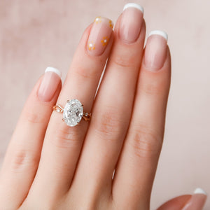 The Twig Set  With A 2.5 Carat Oval 14K Rose Gold Moissanite