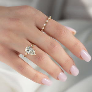 The Twig Set  With A 2.5 Carat Pear 14K Yellow Gold Moissanite