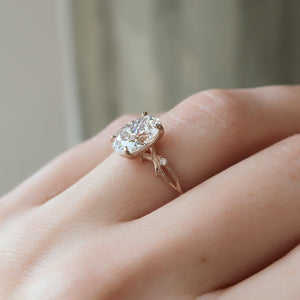 The Textured Twig Set  With A 1.5 Carat Oval 14K Rose Gold Moissanite