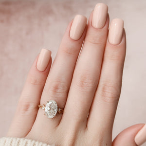 The Textured Twig Set With A 3 Carat Oval 14K Rose Gold Lab Diamond
