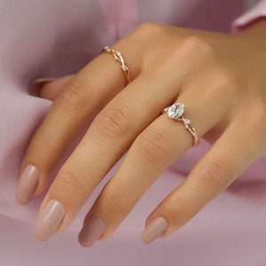 The Textured Twig Set  With A 1.5 Carat Oval 14K Rose Gold Moissanite