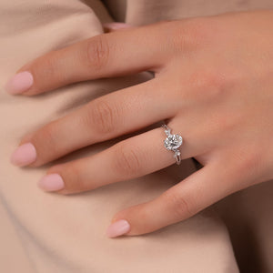 The Textured Twig Set  With A 1.5 Carat Oval 14K White Gold Moissanite