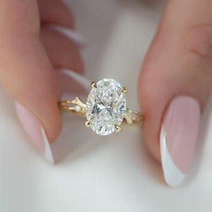 The Textured Twig Set  With A 1 Carat Oval 14K Yellow Gold Moissanite
