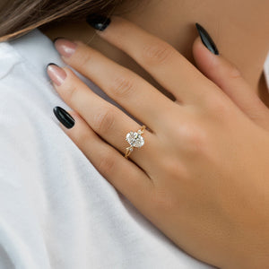 The Textured Twig Set  With A 2 Carat Oval 18K Yellow Gold Moissanite
