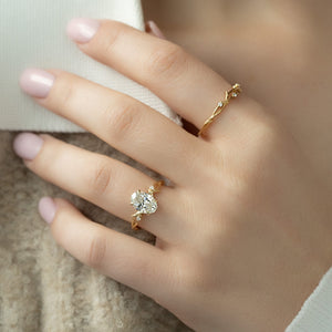 The Textured Twig Set  With A 1 Carat Oval 14K Yellow Gold Moissanite