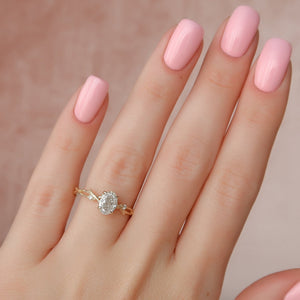 The Textured Twig Set  With A 1.5 Carat Oval 18K Yellow Gold Moissanite