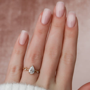 The Textured Twig Set  With A 4 Carat Pear 14K Rose Gold Moissanite