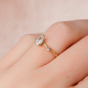 The Textured Twig Set  With A 2.5 Carat Pear 14K Rose Gold Moissanite