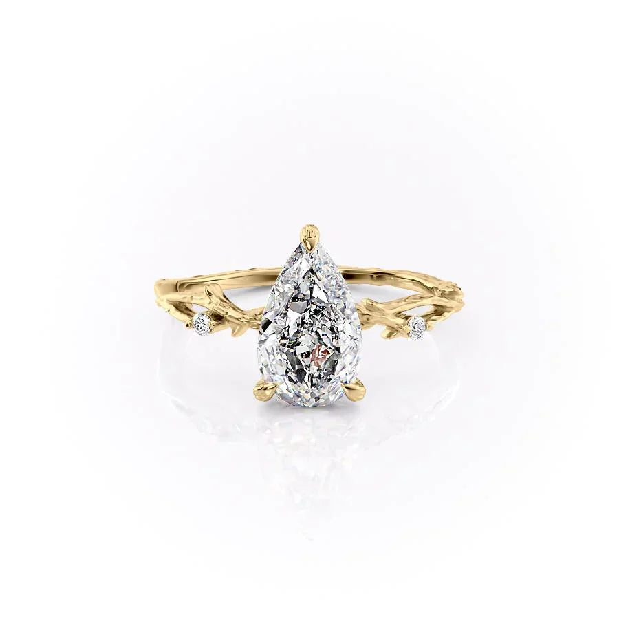 The Textured Twig Set  With A 1 Carat Pear 14K Yellow Gold Moissanite