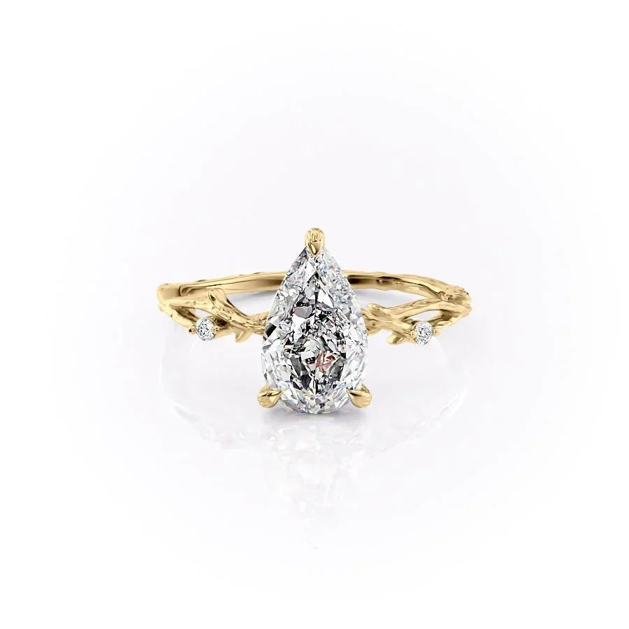 The Textured Twig Set  With A 1.5 Carat Pear 18K Yellow Gold Moissanite