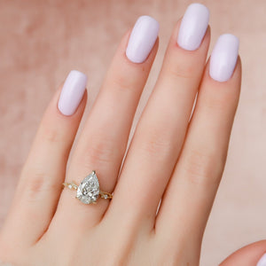 The Textured Twig Set  With A 2.5 Carat Pear 18K Yellow Gold Moissanite