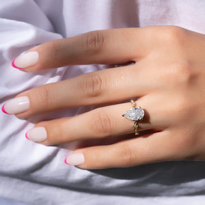 The Textured Twig Set  With A 2.5 Carat Pear 18K Yellow Gold Moissanite