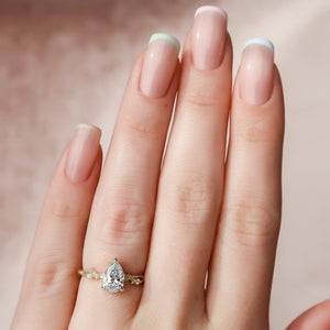 The Textured Twig Set  With A 2.5 Carat Pear 18K Yellow Gold Moissanite